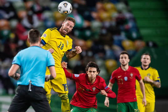 Pontus Jansson of Sweden and Joao Felix of Portugal