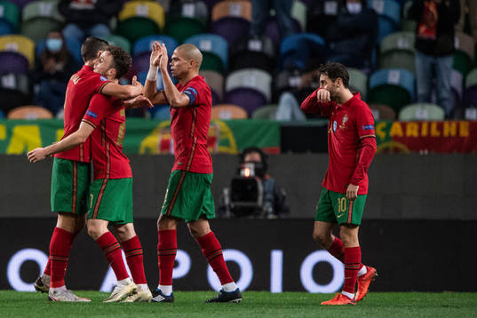 Ruben Dias, Diogo Jota and Pepe of Portugal celebrate