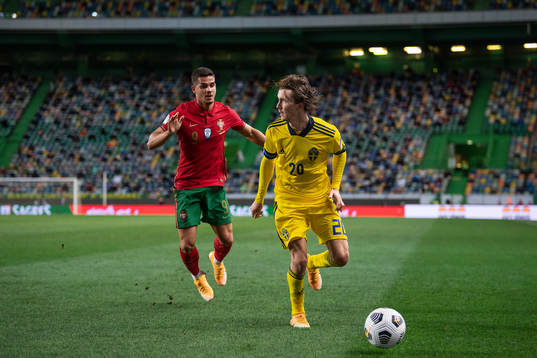 André Silva of Portugal and Kristoffer Olsson of Sweden