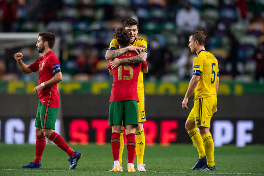 Victor Nilsson Lindelöf of Sweden and Rafa Silva of