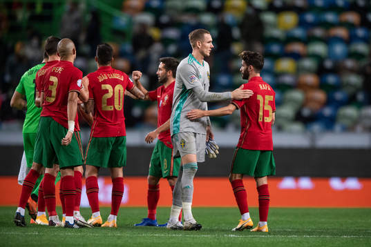 goalkeeper Robin Olsen of Sweden and Rafa Silva of Portugal