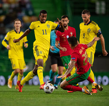 Alexander Isak and Marcus Berg of Sweden against Joao