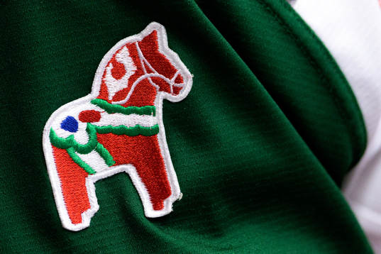 En dalahäst på Moras matchtröja