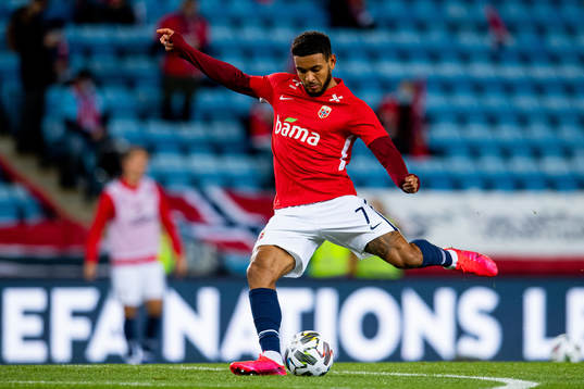 Joshua King of Norway warms up
