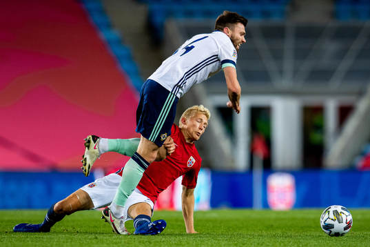 Stuart Dallas of Northern Ireland and Birger Meling of