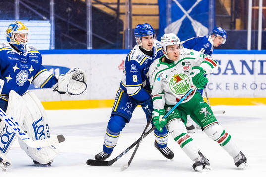 Leksands målvakt Janne Juvonen och Matt Caito mot Rögles