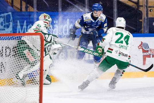 Rögles målvakt Johan Gustafsson och Leksands Nils Åman