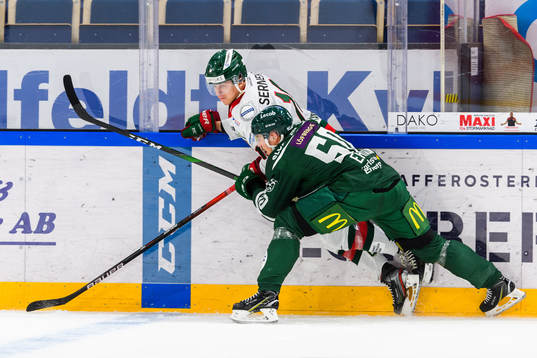 Frölundas Jens Olsson och Färjestads Sebastian Erixon