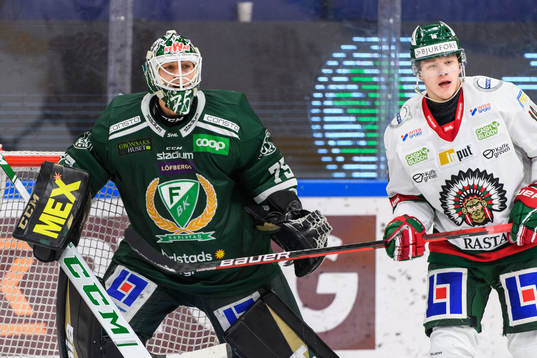 Färjestads målvakt Arvid Holm och Frölundas Jens Olsson