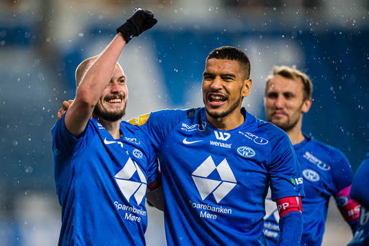 Eirik Hestad of Molde celebrates with Ohikhuaeme "Ohi"