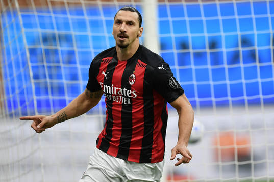 Zlatan Ibrahimovic of Milan celebrates scoring his first