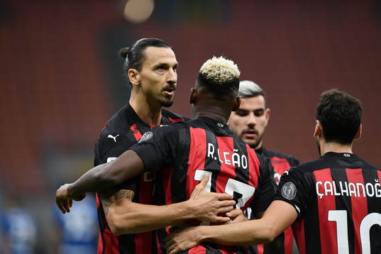 Zlatan Ibrahimovic of Milan celebrate with teammates
