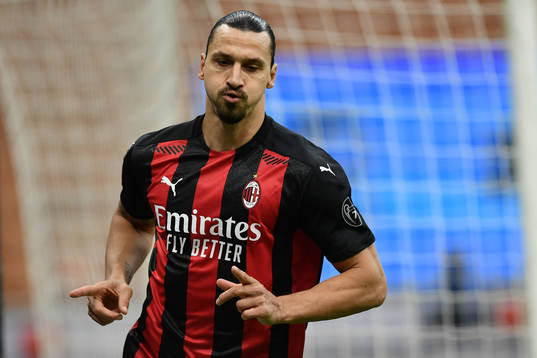Zlatan Ibrahimovic of Milan celebrates scoring his first