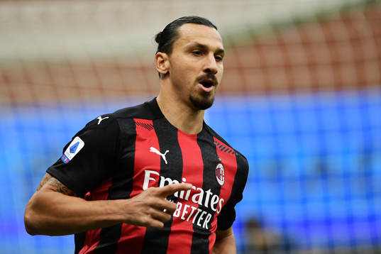 Zlatan Ibrahimovic of Milan celebrates scoring his first