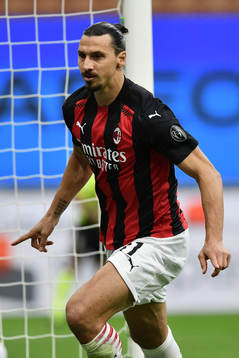 Zlatan Ibrahimovic of Milan celebrates scoring his first