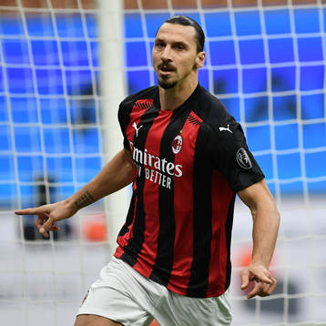 Zlatan Ibrahimovic of Milan celebrates scoring his first