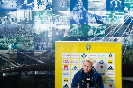 Goalkeeper Jennifer Falk is being interviewed