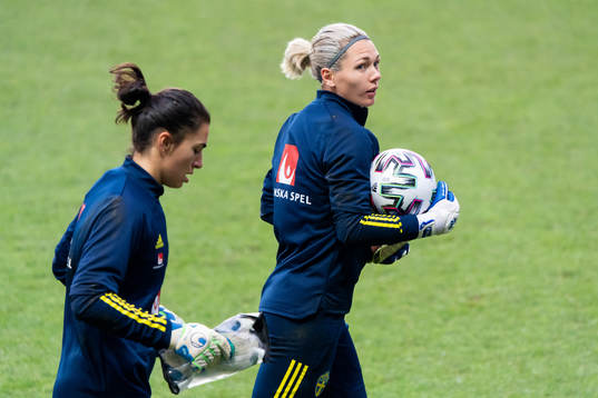 Goalkeeper Zecira Musovic and Jennifer Falk