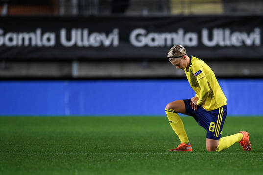Lina Hurtig of Sweden kneels in support of the "Black Lives