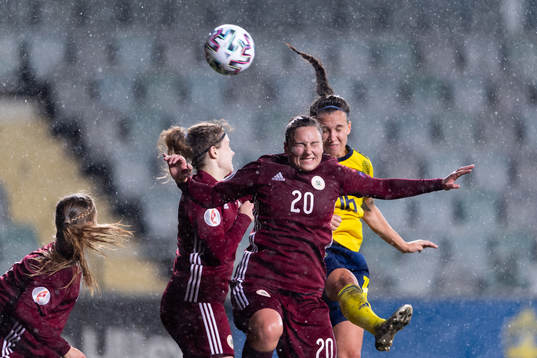 Anastasija Cemirtane of Latvia and Julia Zigiotti Olme of