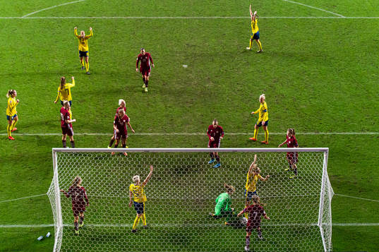 Players of Sweden celebrate