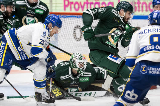 Leksands Patrik Norén och Färjestads målvakt Arvid Holm
