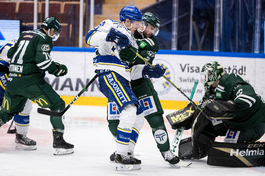 Leksands Emil Heineman och Färjestads Jens Westin och