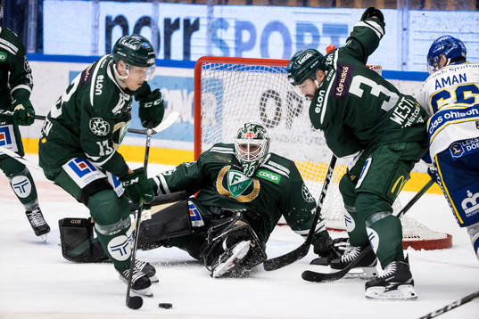 Färjestads målvakt Arvid Holm och Färjestads Jens Westin