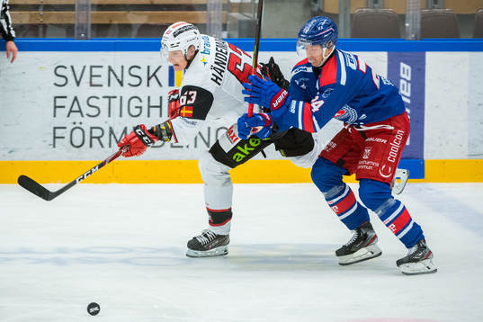 Malmö Redhawks Fredrik Händemark och Oskarshamns Kim