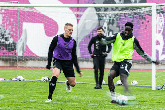 Per Frick och Joseph Okumu