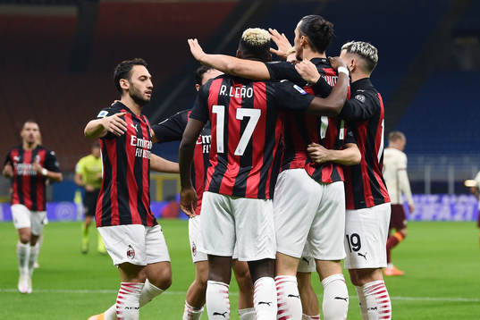 Zlatan Ibrahimovic of Milan celebrate with teammates