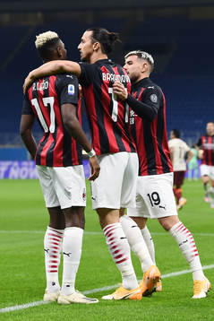 Zlatan Ibrahimovic of Milan celebrate with teammates