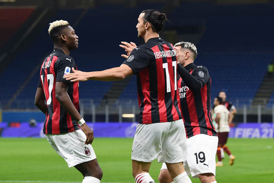 Zlatan Ibrahimovic of Milan celebrate with teammates