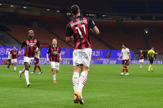 Zlatan Ibrahimovic of Milan celebrate with teammates
