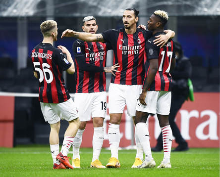 Zlatan Ibrahimovic of Milan celebrate with teammates