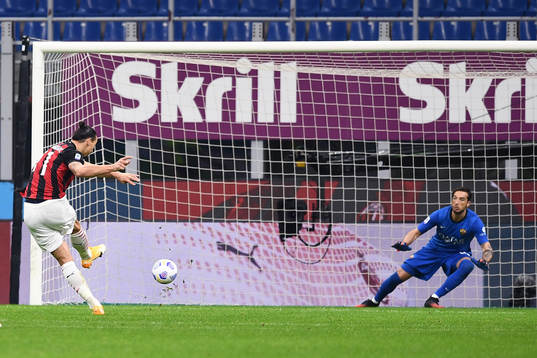 Zlatan Ibrahimovic of Milan scores the 3-2 goal with a