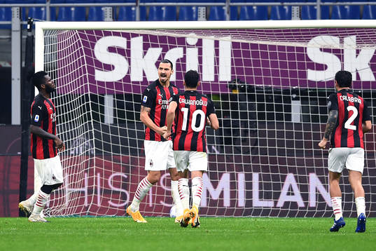Zlatan Ibrahimovic of Milan celebrate with teammates