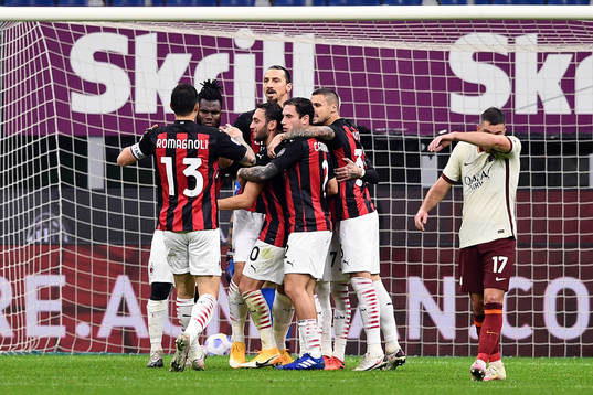 Zlatan Ibrahimovic of Milan celebrate with teammates