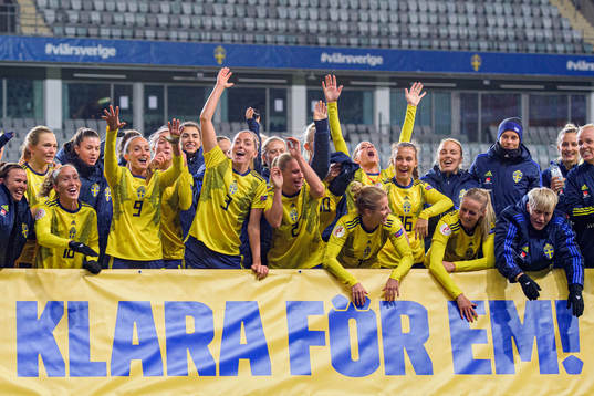 Players of Sweden celebrate