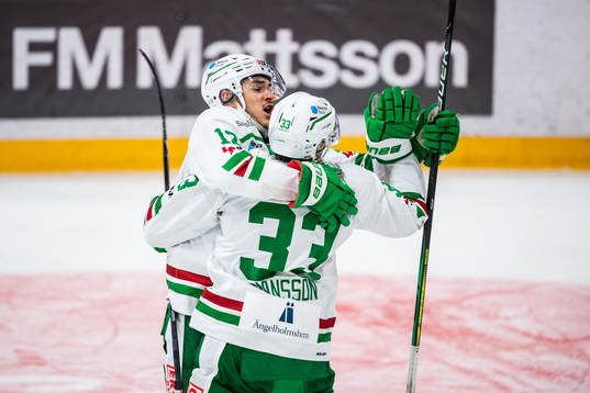 Rögles Brady Ferguson och Niklas Hansson jublar