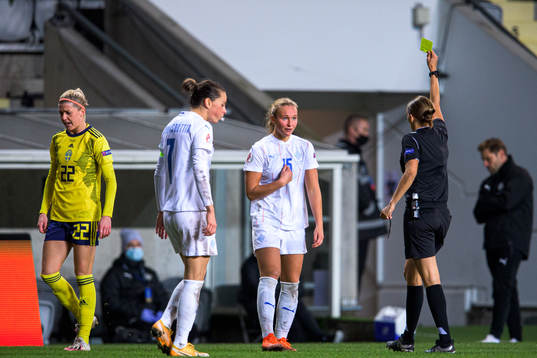 Alexandra Jóhannsdóttir of Iceland receives a yellow card