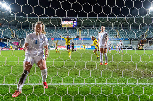 Kosovare Asllani and Anna Anvegård of Sweden celebrate
