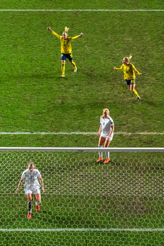 Kosovare Asllani and Anna Anvegård of Sweden celebrate