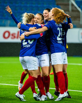 Dejana Stefanovic of Vålerenga celebrates with Rikke Marie