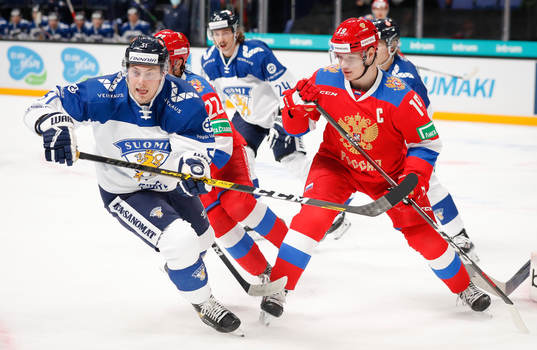 Jarkko Parikka #51, FIN and Vasili Podkolzin #19, RUS