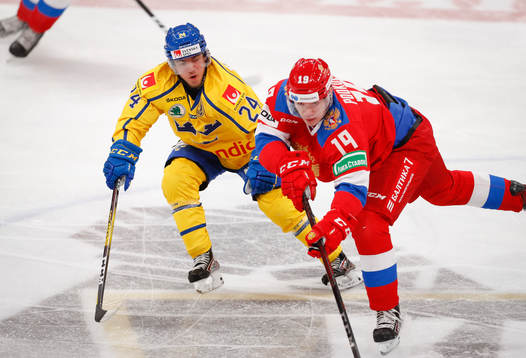 Andreas Wingerli #24, SWE and Vasili Podkolzin #19, RUS