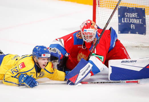 Max Friberg #12, SWE and Yaroslav Askarov #1, RUS