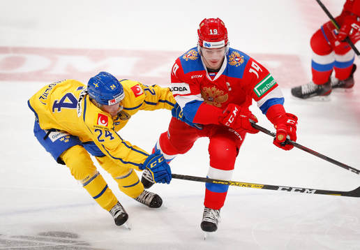 Andreas Wingerli #24, SWE and Vasili Podkolzin #19, RUS