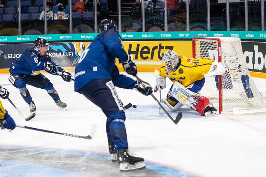 Jere Sallinen #76, FIN, Aleksi Saarela #82, FIN score 1-2,