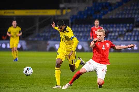 Alexander Isak of Sweden and Andreas Maxsø of Denmark